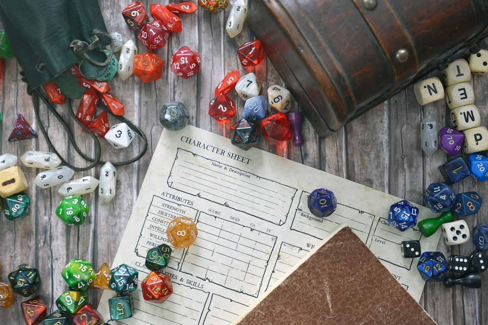 role playing dice and character sheet
